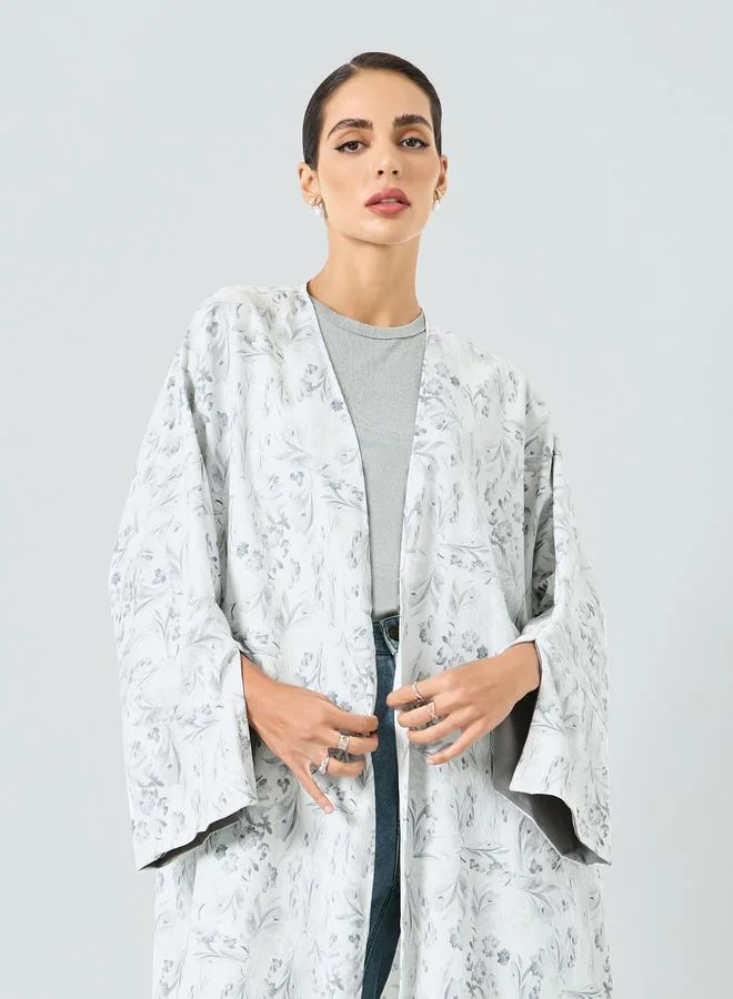 تايك تو عباية بطبعة زهور وأكمام بفتحة